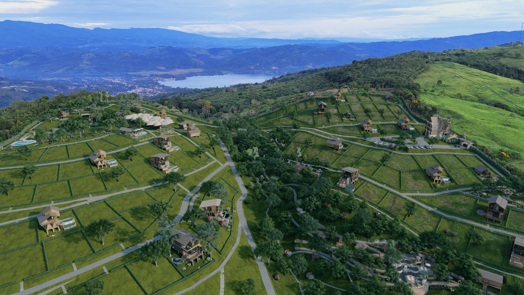 Vista aérea del proyecto NUNA con lotes, cabañas y vista a la Laguna Azul